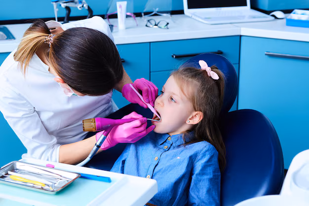 pediatric dentist in Junagadh, space maintainers for kids, children's dentist in Junagadh, Parshvi Dental Care, Dr. Bhumika Hirpara, dental care for children Junagadh, when to get space maintainers, early tooth loss in children, baby teeth care Junagadh, fixed space maintainers, removable space maintainers, kids dental appliances, space maintainer installation, types of space maintainers, dental alignment in children, preventing misaligned teeth in kids, kids dental treatments Junagadh, pediatric dental solutions, Junagadh kids dentist, best pediatric dental clinic Junagadh